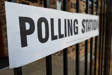 Photo of sign that reads "polling station".